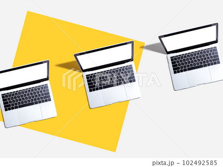 Three laptop computers with shadow 102492585