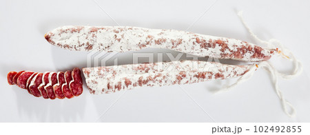Sliced Catalan dry cured sausage Fuet Sliced Catalan dry cured sausage Fuet 102492855