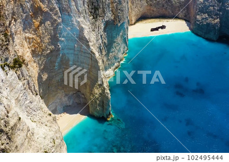 Beautiful landscape of Navagio beach in Greece, a famous tourist attraction with shipwrecks. 102495444