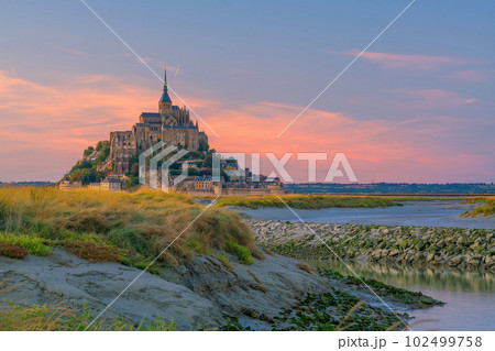 Famous Le Mont Saint-Michel tidal island in Normandy, France Famous Le Mont Saint-Michel tidal island in Normandy, France 102499758