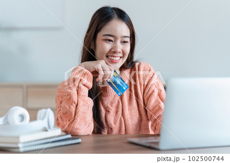 Online store icon, shopping on internet, Asian woman using on virtual screen with hands choosing on smartphone application Online store icon, shopping on internet, Asian woman using on virtual screen with hands choosing on smartphone application 102500744
