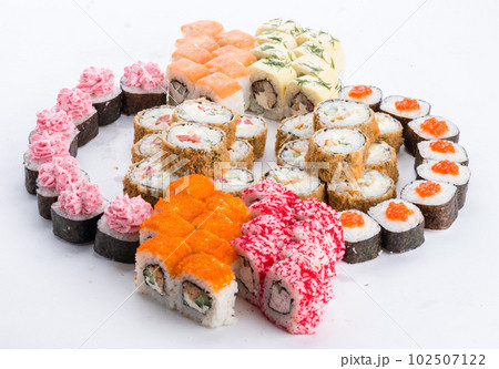 Japanese food restaurant, sushi maki gunkan roll plate or platter set. Sushi set and composition Japanese food restaurant, sushi maki gunkan roll plate or platter set. Sushi set and composition 102507122