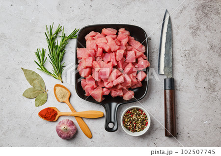 Top view of pork goulash in ceramic pan Top view of pork goulash in ceramic pan 102507745