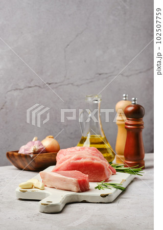 Fresh uncooked pork loin roast 102507759
