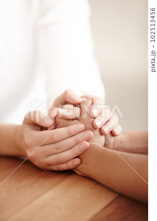 Empathy, love and spiritual with people holding hands in comfort, care or to console each other. Trust, help or support with friends praying together during depression, anxiety or the pain of loss Empathy, love and spiritual with people holding hands in comfort, care or to console each other. Trust, help or support with friends praying together during depression, anxiety or the pain of loss 102513456