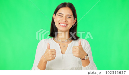 Happy woman, hands and thumbs up on green screen for agreement, winning or success against a studio background. Portrait of female with smile showing thumb emoji, yes sign or like on chromakey mockup Happy woman, hands and thumbs up on green screen for agreement, winning or success against a studio background. Portrait of female with smile showing thumb emoji, yes sign or like on chromakey mockup 102513637