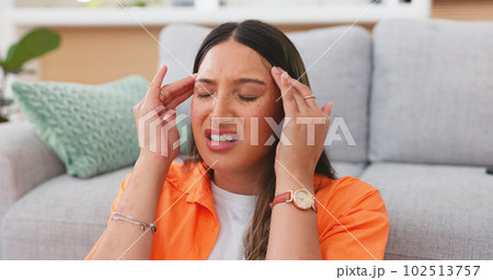 Headache, sick woman and pain in home of stress, dizzy brain or mental health crisis in house. Sad female with migraine, tension and anxiety of burnout, medical problems and frustrated face in lounge Headache, sick woman and pain in home of stress, dizzy brain or mental health crisis in house. Sad female with migraine, tension and anxiety of burnout, medical problems and frustrated face in lounge 102513757
