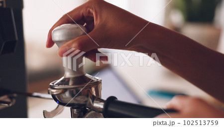Hands, barista and coffee machine with an employee working behind a kitchen counter in a cafe for service. Waiter, cafeteria and caffeine with a person making a drink at work in a restaurant Hands, barista and coffee machine with an employee working behind a kitchen counter in a cafe for service. Waiter, cafeteria and caffeine with a person making a drink at work in a restaurant 102513759