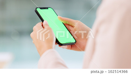 Single female swiping on a dating app. Woman browsing online scrolling social media on a mobile device display with chromakey outside. Hands using a phone showing green screen for copy space. Single female swiping on a dating app. Woman browsing online scrolling social media on a mobile device display with chromakey outside. Hands using a phone showing green screen for copy space. 102514366