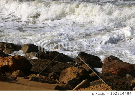 stones on the shores of the Mediterranean Sea in northern Israel 102514494
