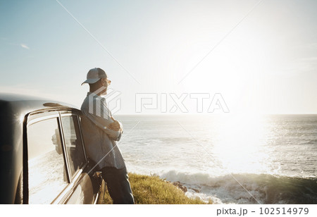 Theres something calming about a day at the coast. a young man on a road trip along the coast. Theres something calming about a day at the coast. a young man on a road trip along the coast. 102514979