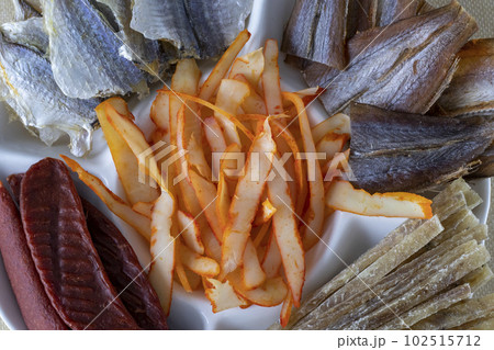 Salted dried fish, beer snack close-up 102515712
