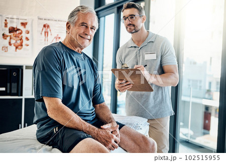 My recovery is all thanks to him. Portrait of a mature man smiling during a consultation with his physiotherapist in the rehabilitation center. 102515955
