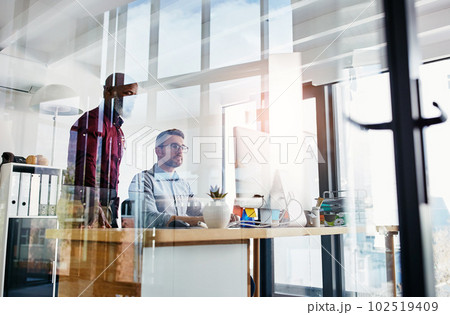 Ready to give valuable advice. two businesspeople working on a computer in an office. 102519409
