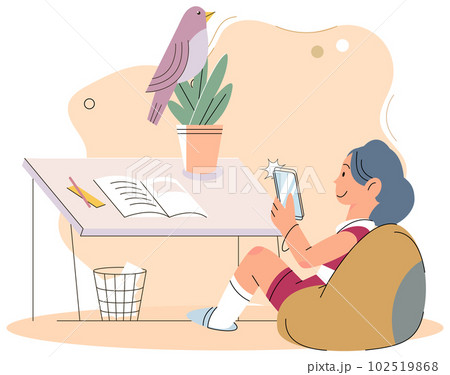 Child with tablet pc sitting on bag chair at home, chatting, communicating using electronic device 102519868