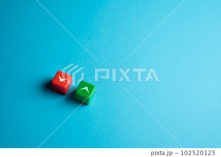 Arrow up and down on blocks. Market rise or fall. Long or short. Buy or sell. Analysis of trends. Red and green 102520125