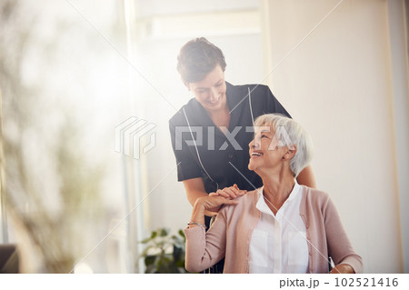 Support, wheelchair and senior woman with a nurse in a retirement home for wellness and healthcare. Medical, disability and elderly female person bonding with a professional rehabilitation worker. 102521416