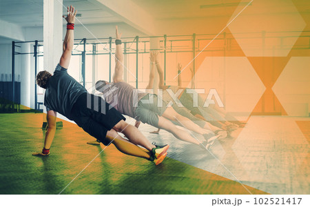 Fitness people, gym and group side plank exercise, workout and training in class. Athlete men and women from back for power challenge, commitment or strong muscle at a club with mockup overlay 102521417
