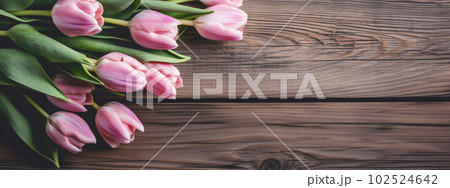 Pastel pink tulip flowers on rustic wooden background. Floral Greeting card for Spring Holidays or banner with copy space for text. Generative AI. Pastel pink tulip flowers on rustic wooden background. Floral Greeting card for Spring Holidays or banner with copy space for text. Generative AI. 102524642