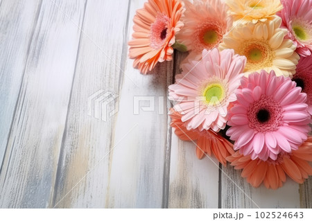 Colorful gerbera daisy bouquet on white wooden background, copy space for text. Pink, orange, red flowers. Floral greeting card mockup for Mother's Day, Valentine's, Wedding invitation. Generative AI Colorful gerbera daisy bouquet on white wooden background, copy space for text. Pink, orange, red flowers. Floral greeting card mockup for Mother's Day, Valentine's, Wedding invitation. Generative AI 102524643