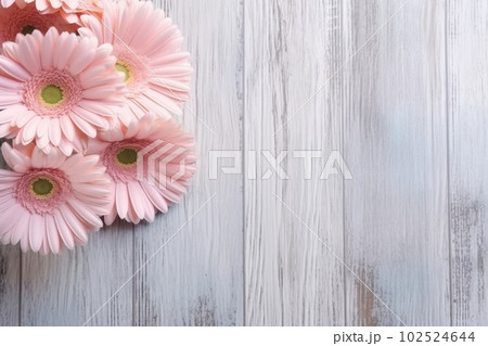 Pink delicate gerbera daisy bouquet on white wooden background, copy space for text. Floral greeting card for Mother Day or Valentines, Wedding invitation mock-up. Generative AI. 102524644