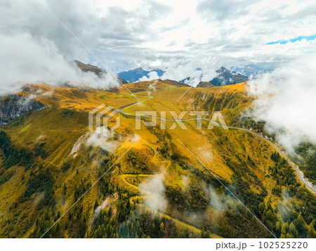 With its cloudswept slopes, the celebrated Giau Pass is accompanied by a majestic mountain range 102525220