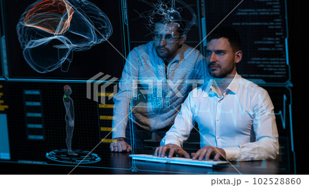 Two Caucasian bearded men are discussing medical screen of a virtual menu. Human brain research. Two Caucasian bearded men are discussing medical screen of a virtual menu. Human brain research. 102528860