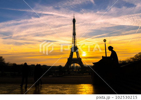 Silhouettel view of famous Eiffel Tower in Paris at sunrise time in winter, France. Paris Best Destinations in Europe. Silhouettel view of famous Eiffel Tower in Paris at sunrise time in winter, France. Paris Best Destinations in Europe. 102530215