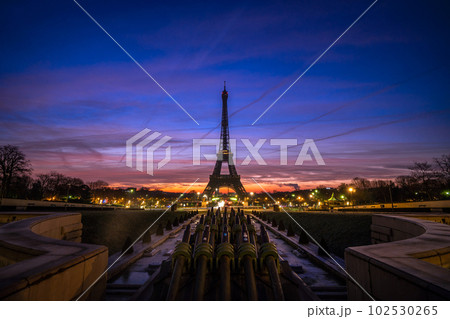 Beautiful view of famous Eiffel Tower in Paris before sunrise time in winter, France. Paris Best Destinations in Europe. Beautiful view of famous Eiffel Tower in Paris before sunrise time in winter, France. Paris Best Destinations in Europe. 102530265