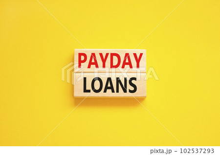 Payday loans symbol. Concept words Payday loans on beautiful wooden block. Beautiful yellow table yellow background. Business and Payday loans concept. Copy space. Payday loans symbol. Concept words Payday loans on beautiful wooden block. Beautiful yellow table yellow background. Business and Payday loans concept. Copy space. 102537293