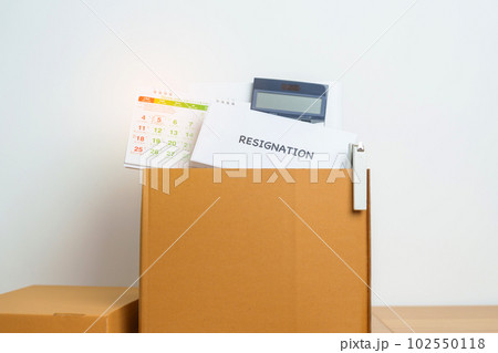 Resignation, Layoff, Unemployment, Dismiss, Job quit, Jobless and Farewell concept. letter of Resign contract with documents cardboard box at office 102550118