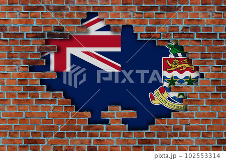 3D Flag of Cayman Islands behind the broken old stone wall background. 102553314