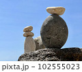 stone sculpture on the blue sky background 102555023