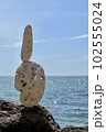 Stone sculpture on the background of the sea 102555024