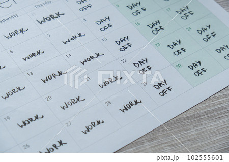 4 day work week printed calendar with weekend days four day working week concept. Modern approach doing business short workweek. Effectiveness of employees. Productivity and efficiency 102555601