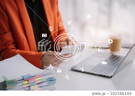 Businesswoman are calculating income-expenditure and analyzing real estate investment data at office, Accounting Financial and tax systems concept. Businesswoman are calculating income-expenditure and analyzing real estate investment data at office, Accounting Financial and tax systems concept. 102566104