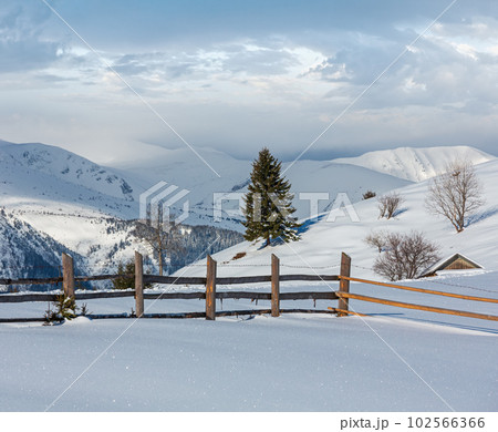 Winter mountain rural snow covered hill slope Winter mountain rural snow covered hill slope 102566366