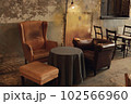 set of sitting chairs in pop up cafe 102566960