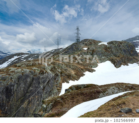 Summer mountain landscape with high voltage electric lines (Grimsel Pass, Switzerland) Summer mountain landscape with high voltage electric lines (Grimsel Pass, Switzerland) 102566997