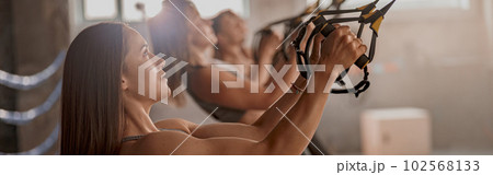 Shot of fitness group having workout session at gym 102568133