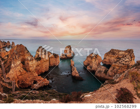 Evening Ponta da Piedade landscape (along coastline of Lagos town, Algarve, Portugal). Evening Ponta da Piedade landscape (along coastline of Lagos town, Algarve, Portugal). 102568299