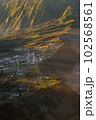 Small town on the hill with sunlight. 102568561