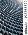 Facade of the office building was designed in beehive. 102568579