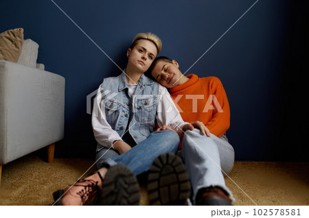 Romantic lesbian couple enjoying calm and happiness moments together 102578581