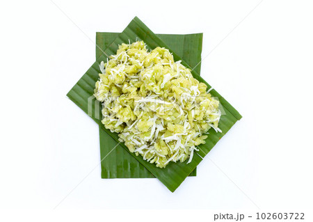 Green rice Thai dessert with coconut (Khao Mao) Green rice Thai dessert with coconut (Khao Mao) 102603722