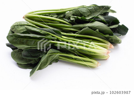 Fresh spinach on white background Fresh spinach on white background 102603987