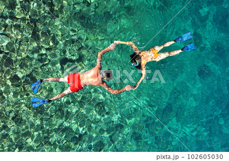 Romantic couple snorkeling in Thailand Romantic couple snorkeling in Thailand 102605030