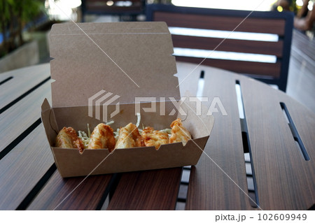 Box and gyozas. Box and gyozas. 102609949