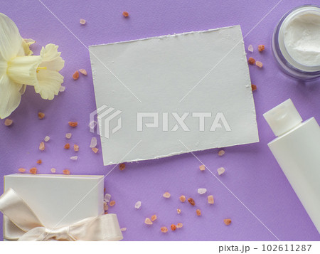 daffodils flower, bottle, gift box and paper card with copy space daffodils flower, bottle, gift box and paper card with copy space 102611287