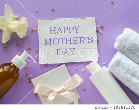daffodils flower, towels and paper card with copy space daffodils flower, towels and paper card with copy space 102611376